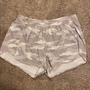 athelta run with it shorts